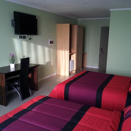Hotel Astore Suites Antofagasta Bilik gambar