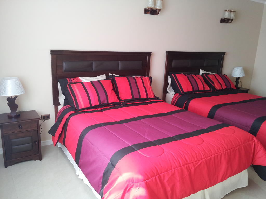 Hotel Astore Suites Antofagasta Bilik gambar