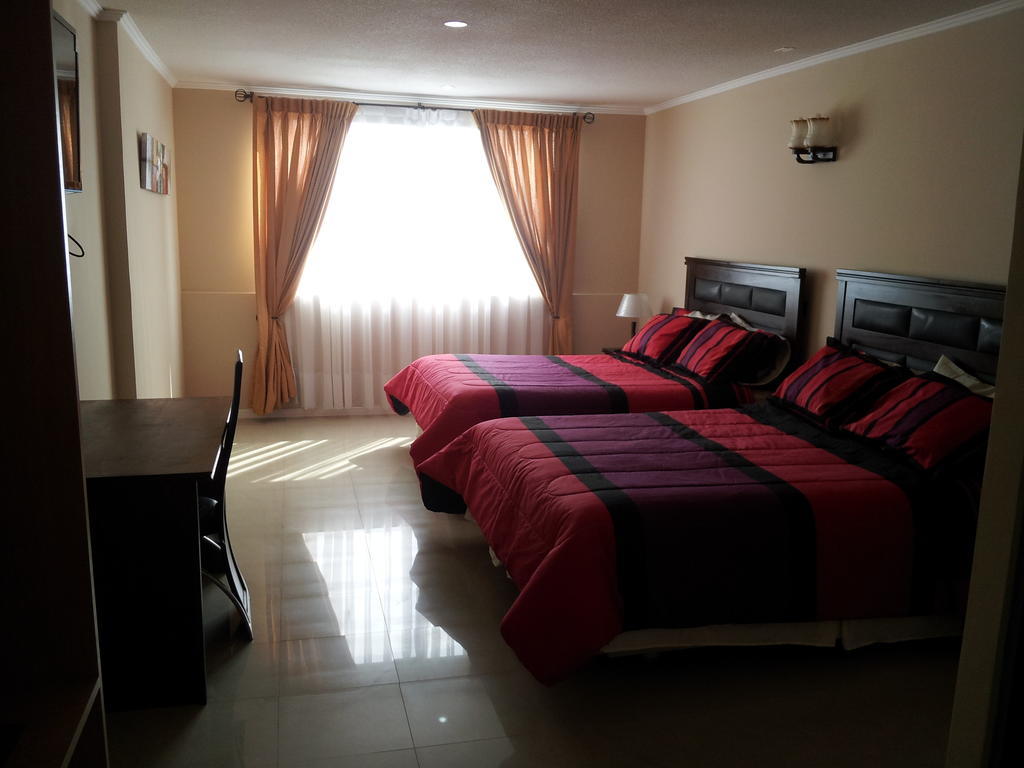Hotel Astore Suites Antofagasta Bilik gambar